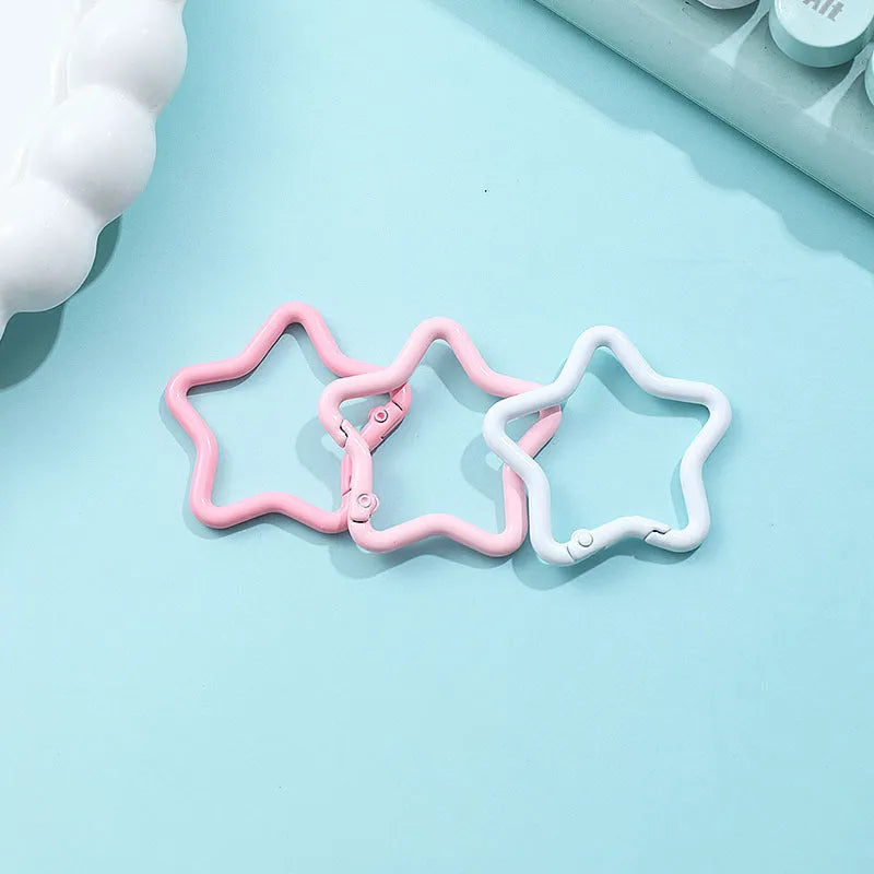 Zinc alloy five-pointed star keychain in a choice of macaron colours for bag decoration.