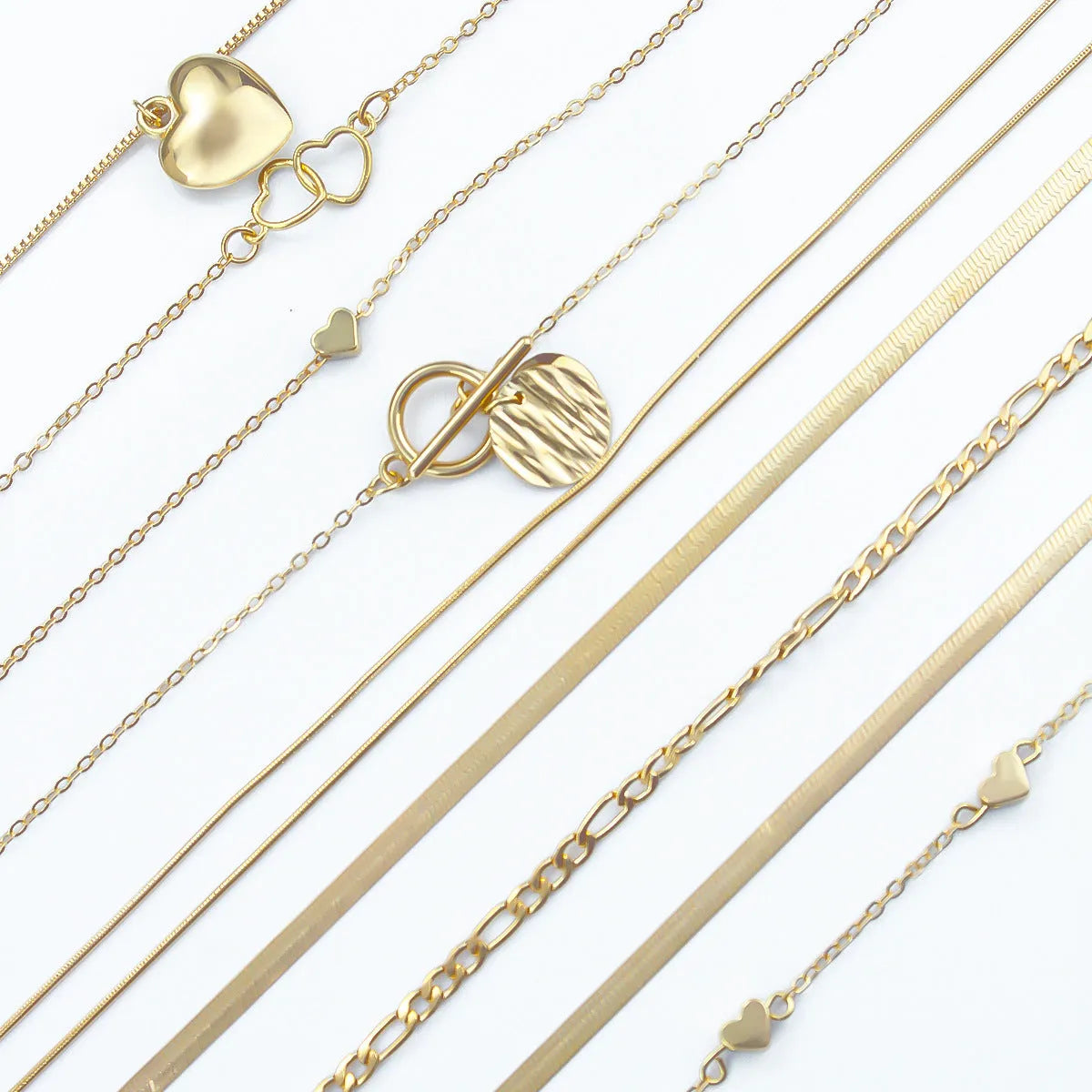 10-piece gold electroplated women's necklace set with alloy pendants on adjustable snake bone chain