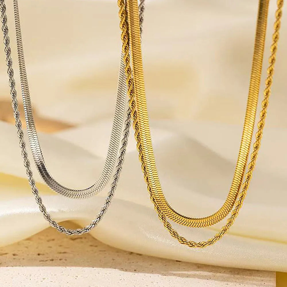 Women's retro geometric double-layer twist necklace in silver or gold tone on adjustable snake bones chain.