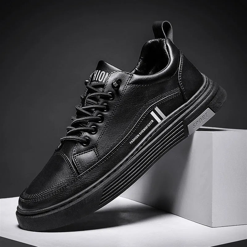Men's white low-top skate shoes with microfibre upper, round toe, flat rubber sole and elastic band