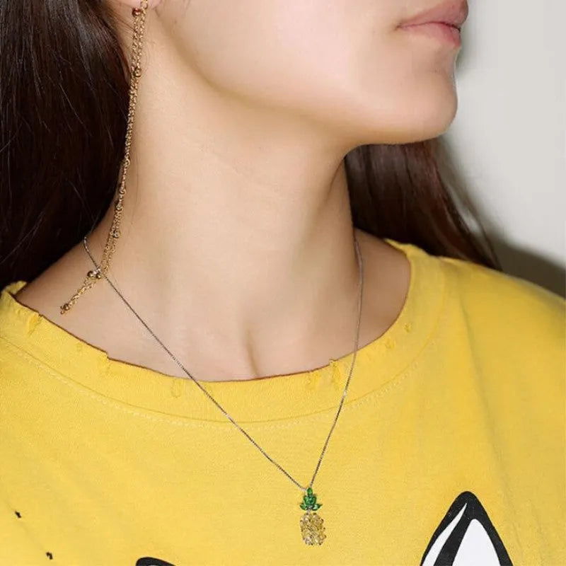 Women's geometric pineapple necklace with silver finish and detailed fruit charm