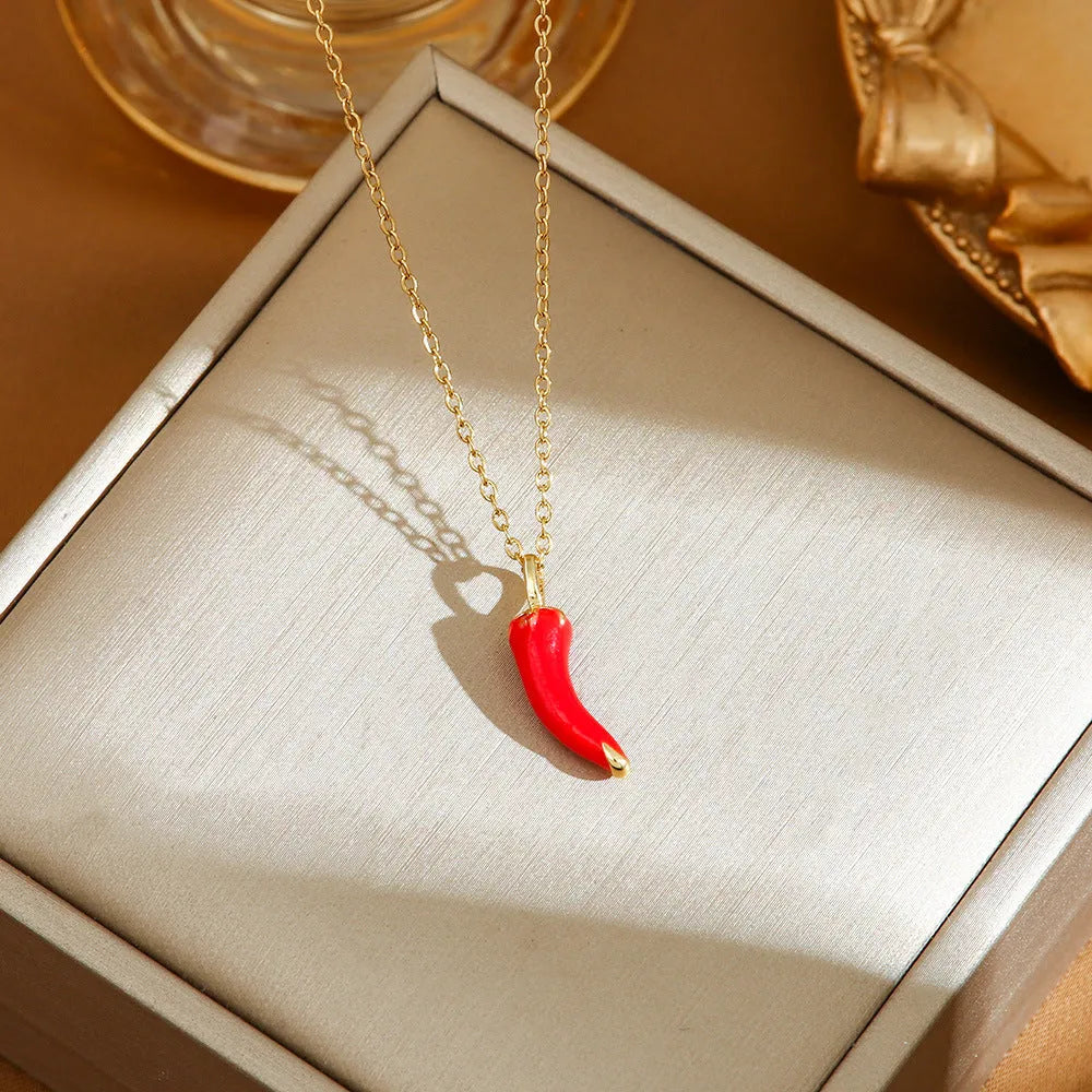 Delicate titanium steel necklace with a small cherry charm on an O-ring chain.