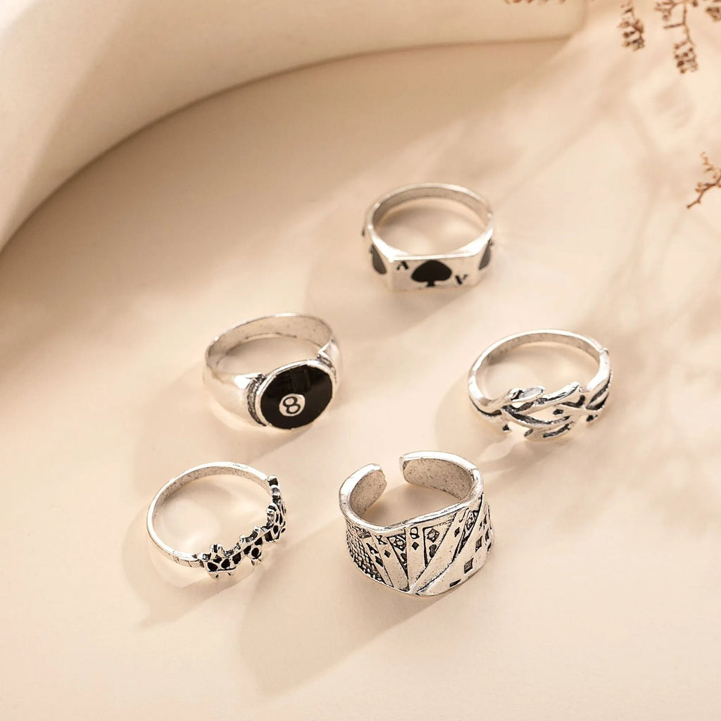 Black alloy poker ring with raised spade card design for women's jewellery