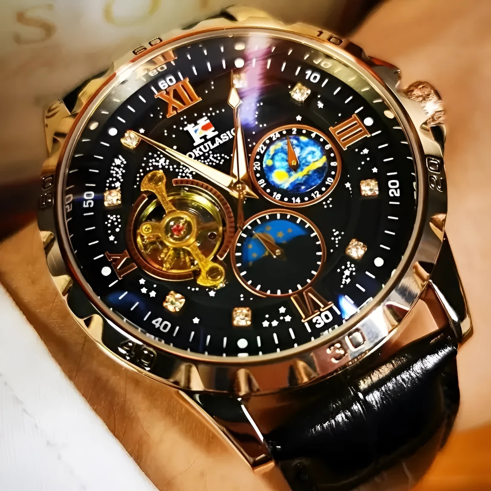Men's black automatic mechanical watch with rose gold case and hollow dial showing movement