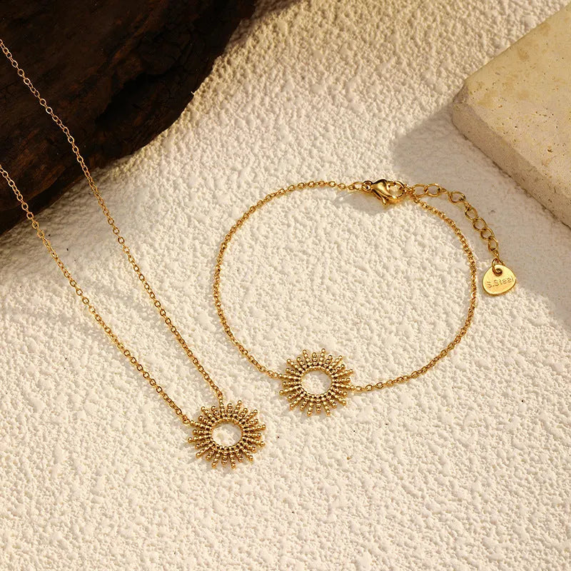 Sunflower Series 14K gold-plated jewellery set showing matching necklace and bracelet with geometric design
