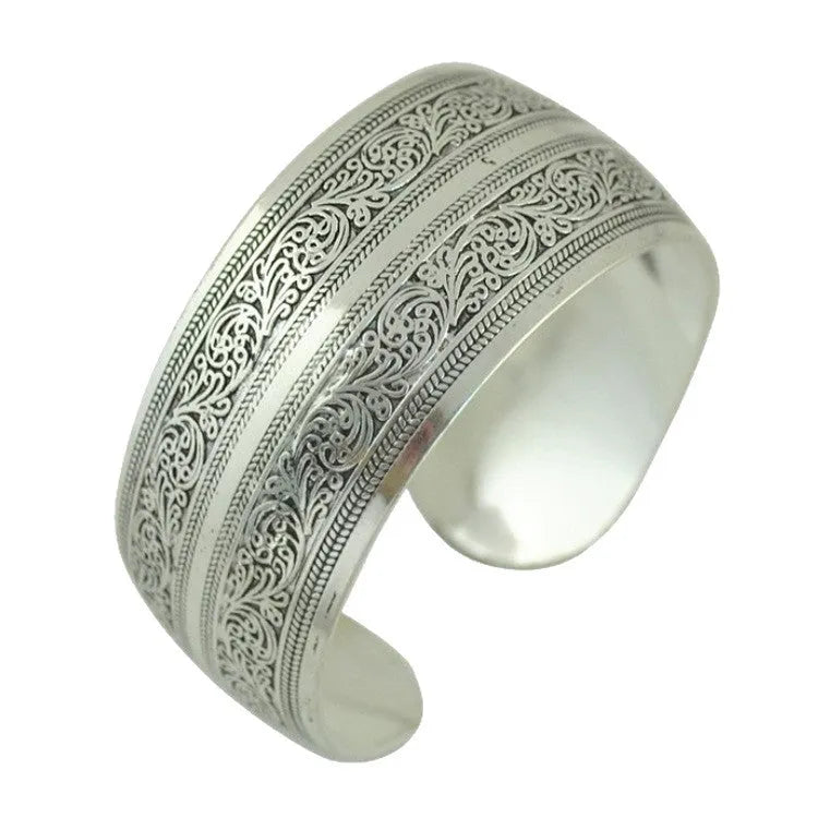 Ethnic carved open Miao silver bracelet with diamond treatment in Roman shape