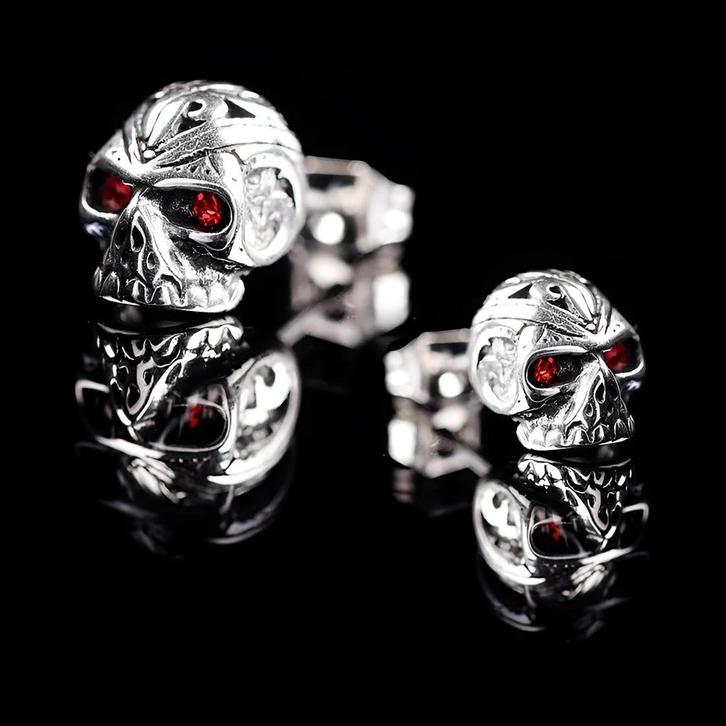 Retro skull stud earrings with red eye detailing and electroplated alloy construction