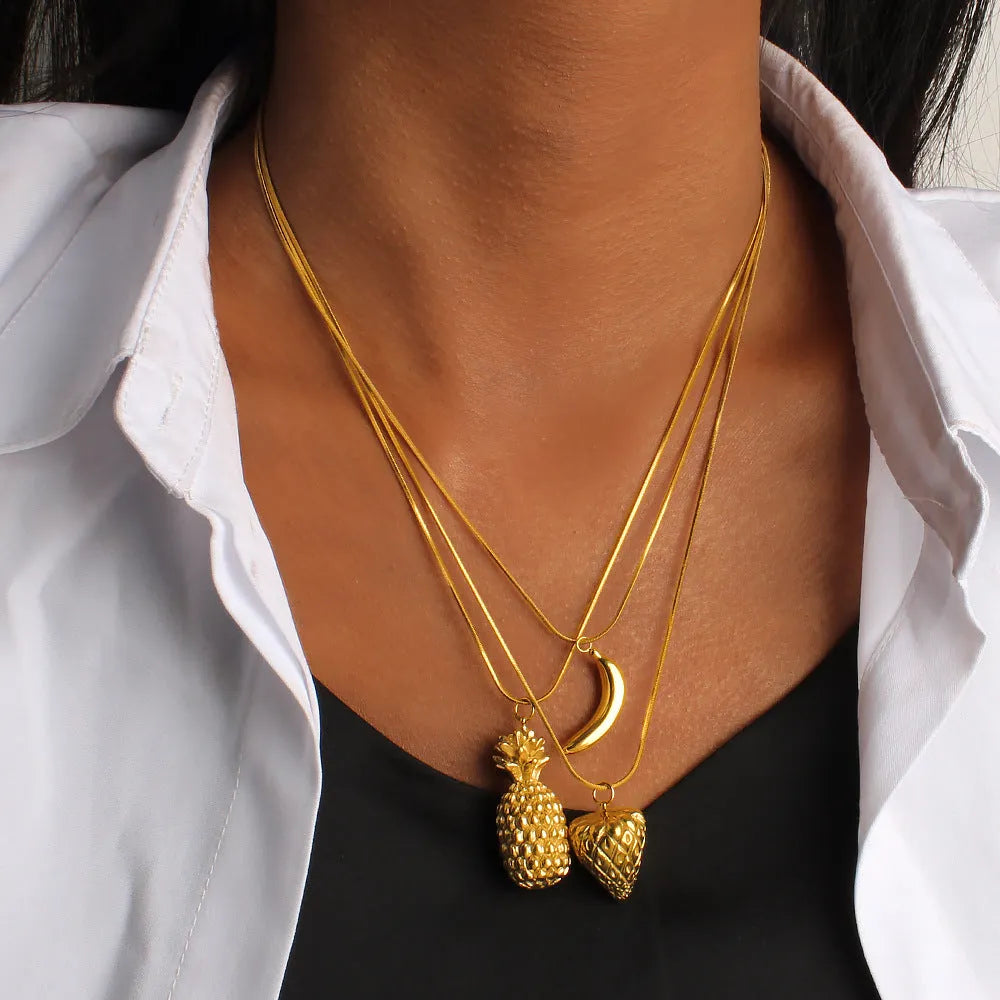 Stainless steel necklace with a colourful fruit-shaped pendant charm on a regular chain.