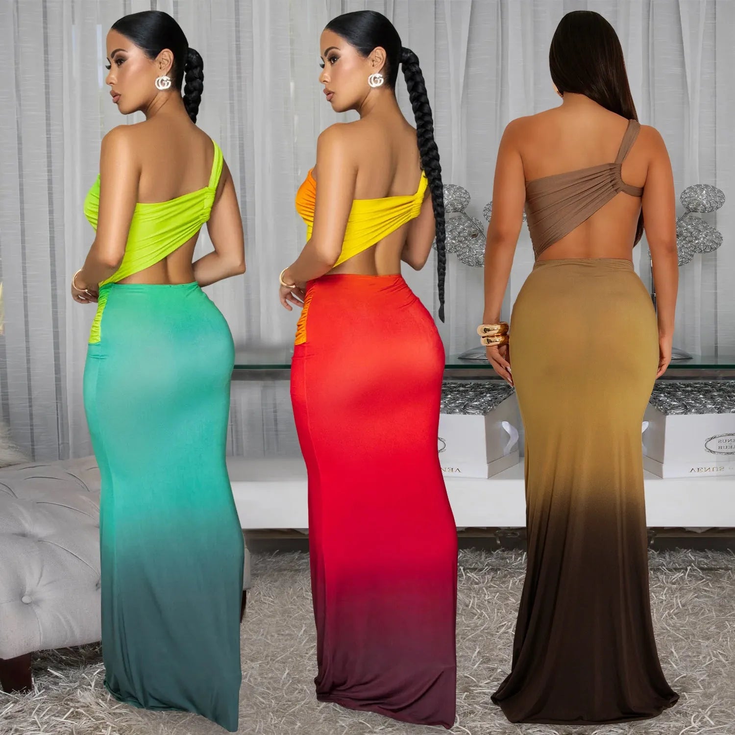 Long gradient-colour summer dress with oblique shoulder neckline and sleeveless design on a mannequin.