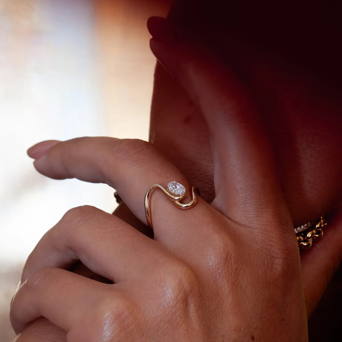 Geometric zircon ring with no-fade titanium steel finish in silver tone.