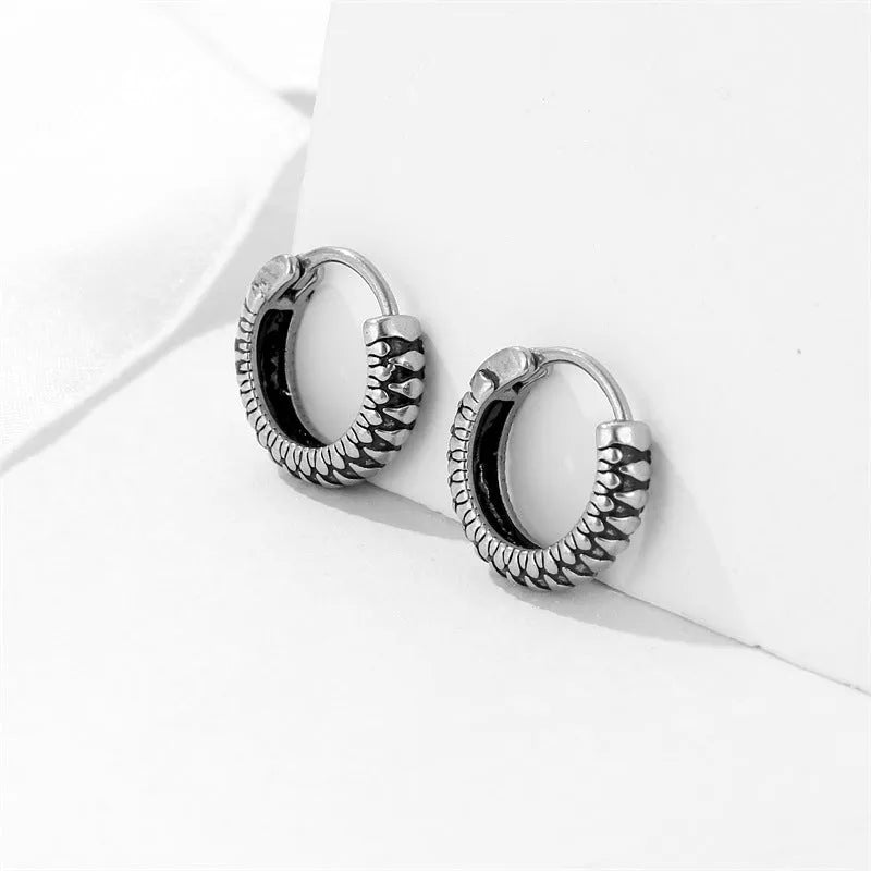 Geometric retro twist stainless steel earrings with stripe design in silver colour