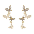 Women's copper butterfly drop earrings with four-element design and gold colour finish