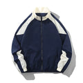 Men's black loose-fit casual jacket with contrast stitching and side pockets for spring and autumn.