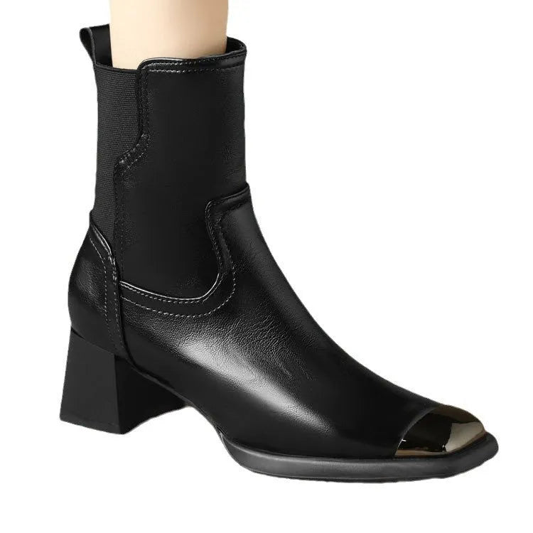 Brown slim-fit women's Martin boots with high heel and side zip on a white background