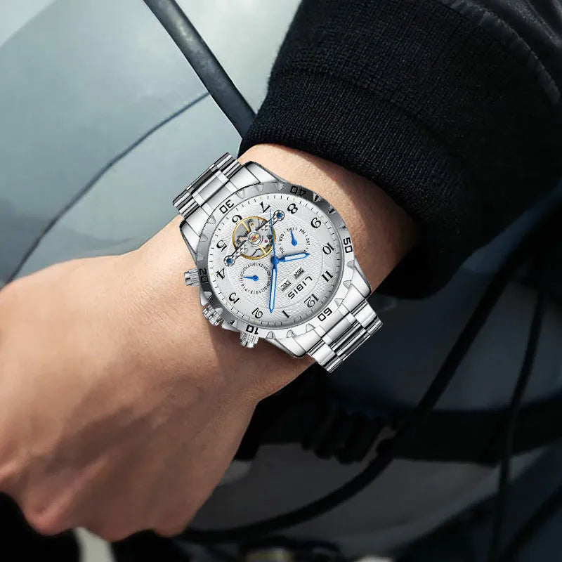Men's silver automatic perpetual calendar mechanical watch with stainless steel strap.
