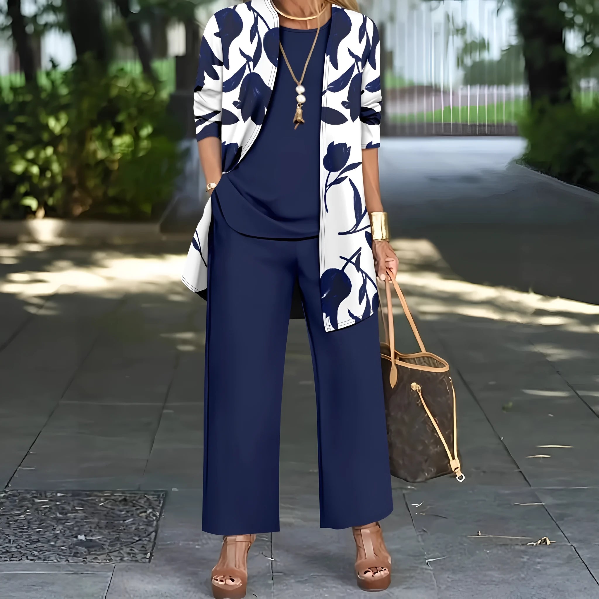 Women's printed three-piece casual suit set in polyester, showing jacket, vest, and trousers.