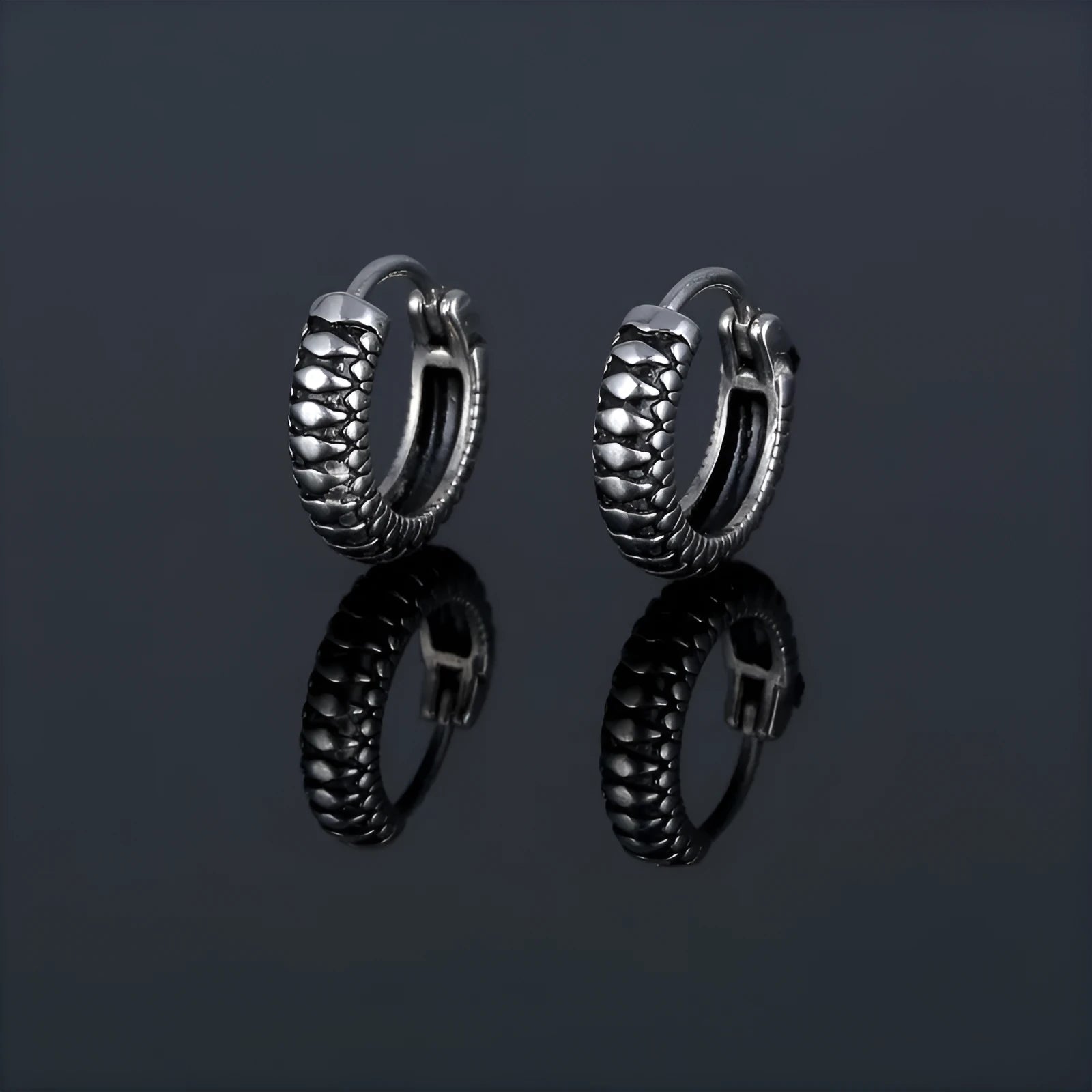 Geometric retro twist stainless steel earrings with stripe design in silver colour
