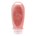 Silicone bath brush storage bottle in a selection of colours including pink, orange, and light grey.