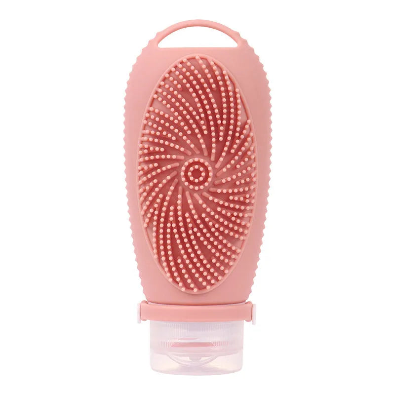 Silicone bath brush storage bottle in a selection of colours including pink, orange, and light grey.