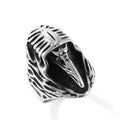 Geometric crow stainless steel ring in MR166 colour on a grey background