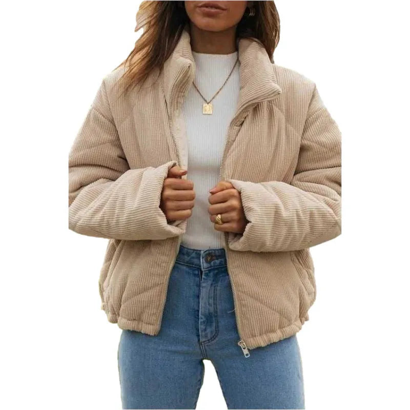 Apricot coloured women's corduroy jacket with stand collar and front zip, showing textured fabric detail