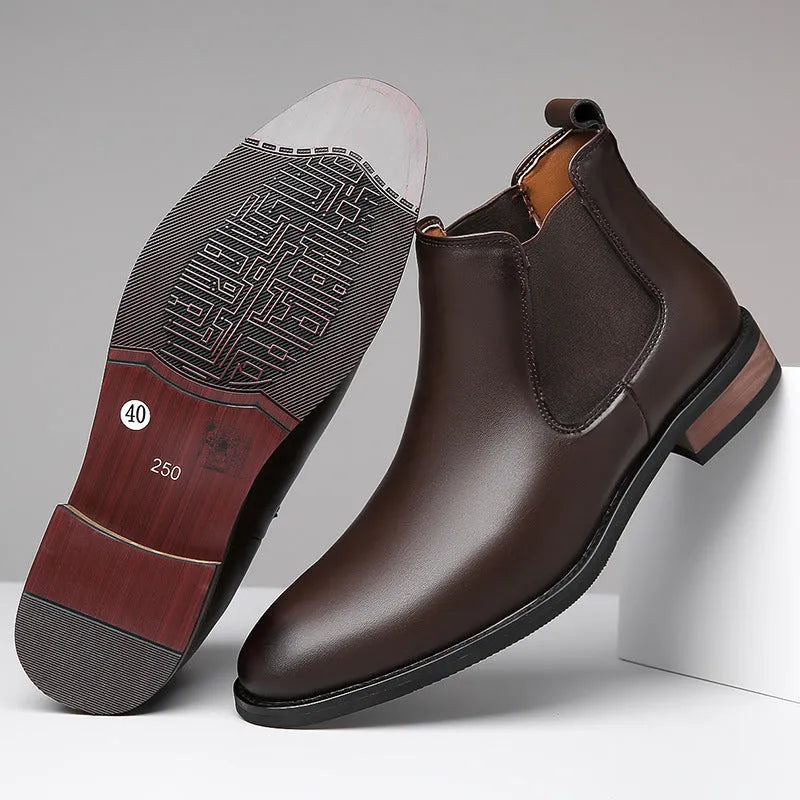 Men's black pointed toe Chelsea boots with artificial PU leather upper and decorative stitching