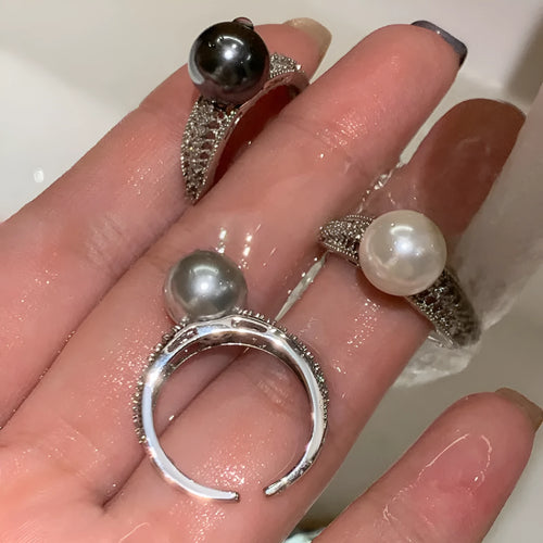 Adjustable black pearl copper ring with geometric open design for women