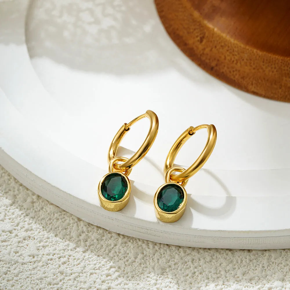 Women's retro oval zircon earrings in copper showing elliptical design