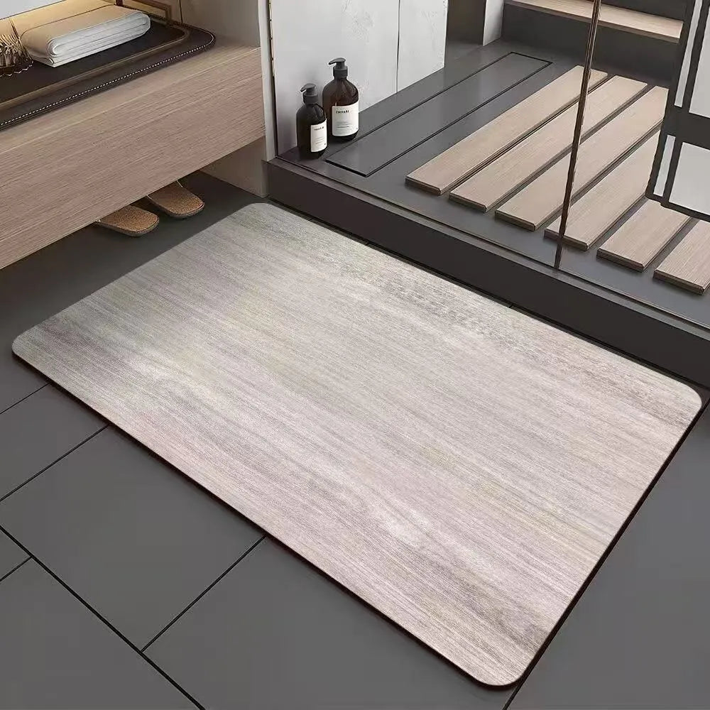 Square American-style diatom ooze floor mat with a geometric wood grain pattern in a bathroom setting.