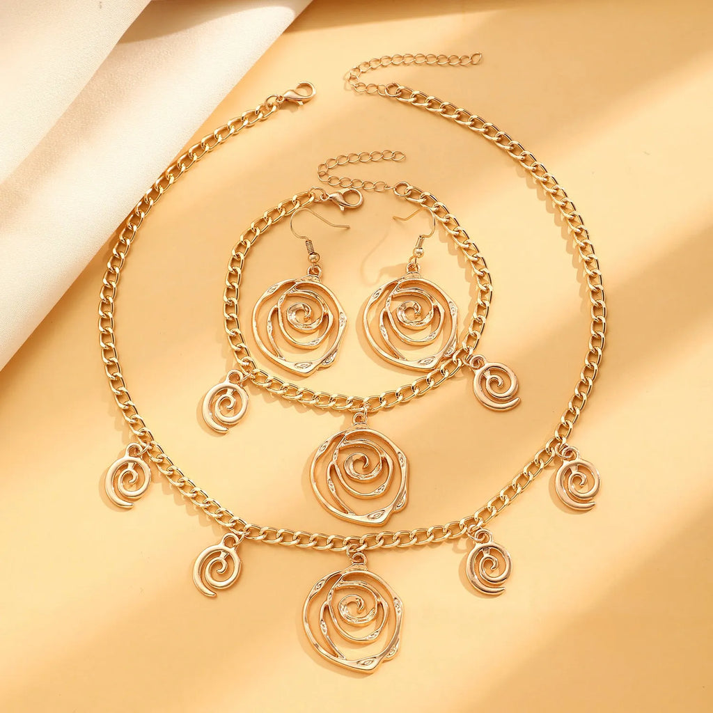 Geometric spiral donut jewellery set with necklace, bracelet, and earrings on adjustable 41-50cm chain