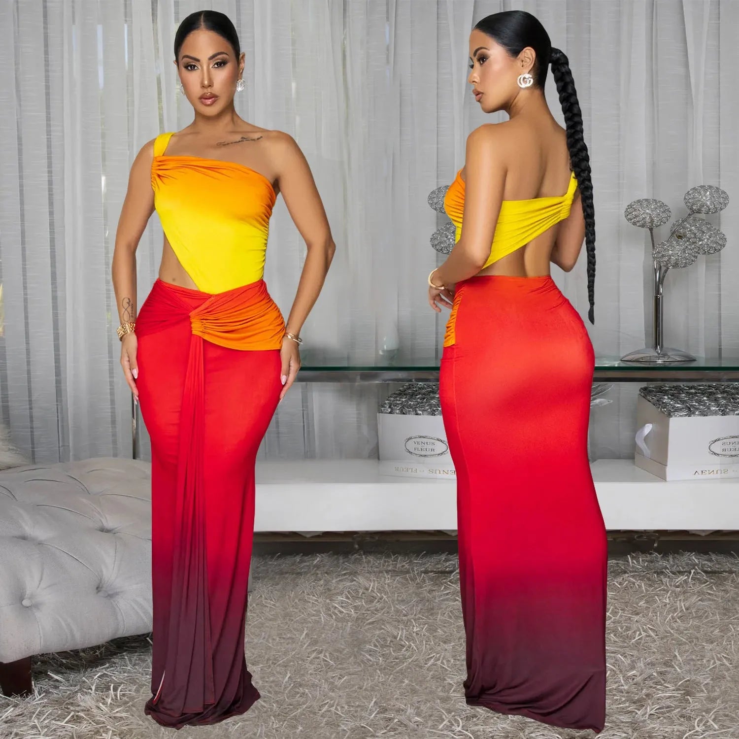 Long gradient-colour summer dress with oblique shoulder neckline and sleeveless design on a mannequin.