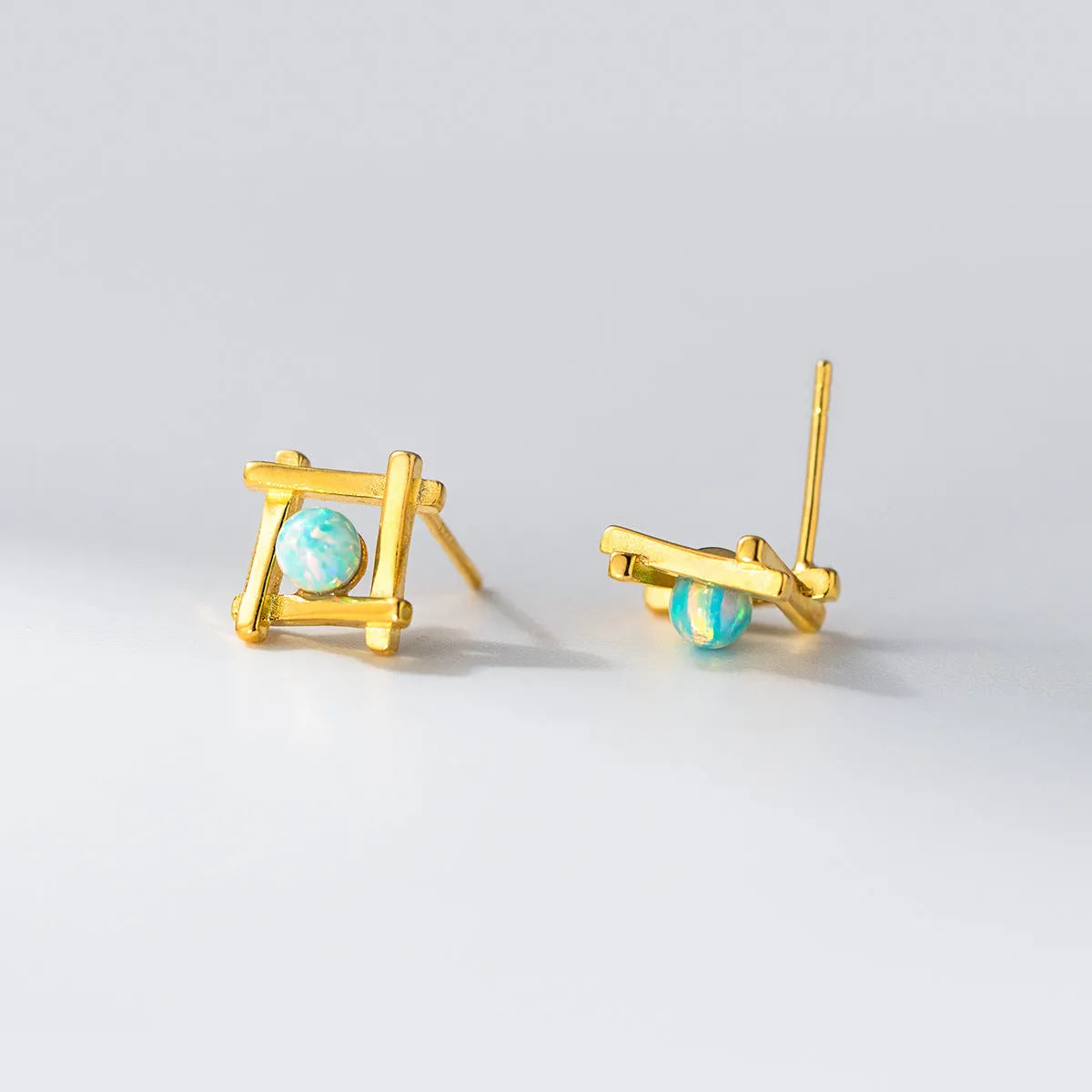 Geometric cross quadrangle stud earrings in sterling silver with gold or silver plating options
