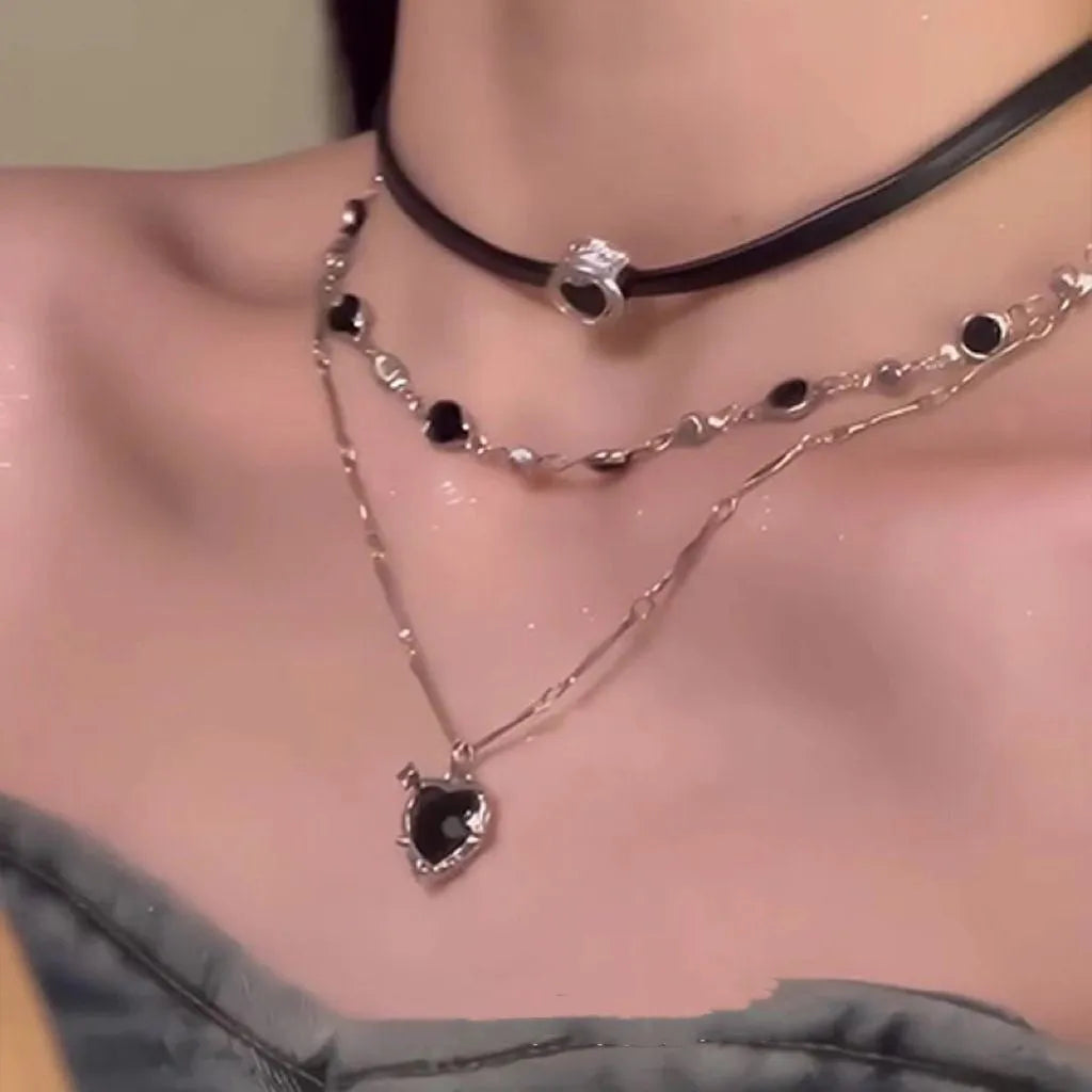 Women's adjustable leather chain necklace set with artificial crystal heart pendants in multi-layer design