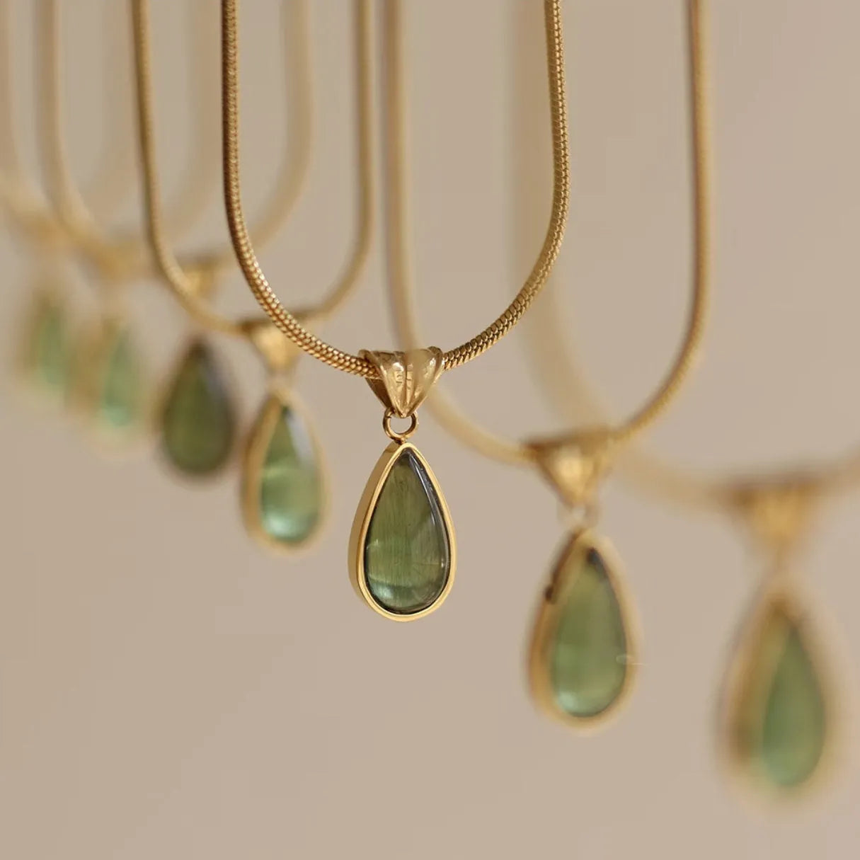 Retro blue and green water drop necklace with mixed gem inlaid pendant on titanium steel snake bones chain