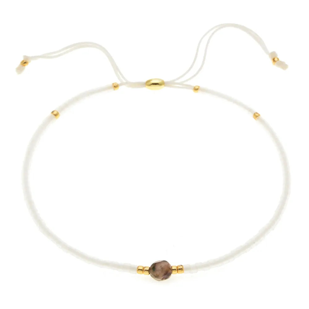 Handmade bohemian-style bracelet with colourful geometric glass beads for women.
