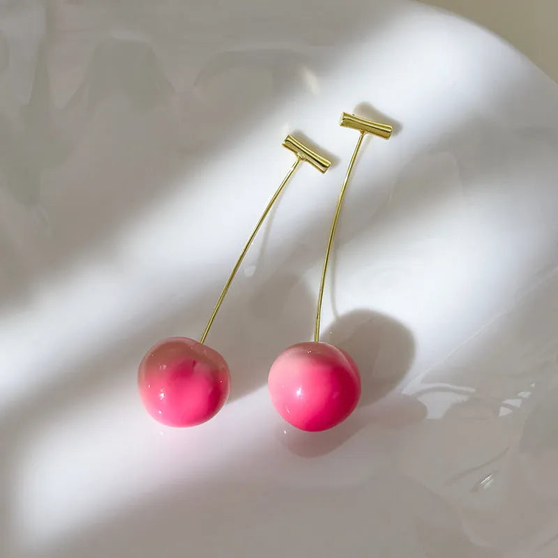 Acrylic peach fruit earrings for women in small and large peach colour variations