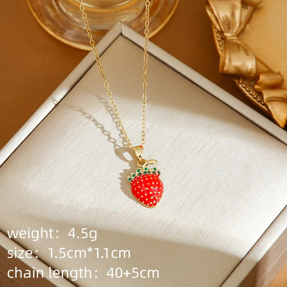 Delicate titanium steel necklace with a small cherry charm on an O-ring chain.