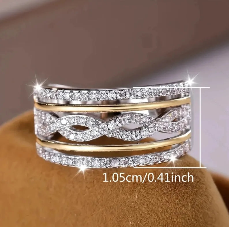 Platinum alloy wide face ring with hollow jeweled detailing, diamond treatment finish, women's ring