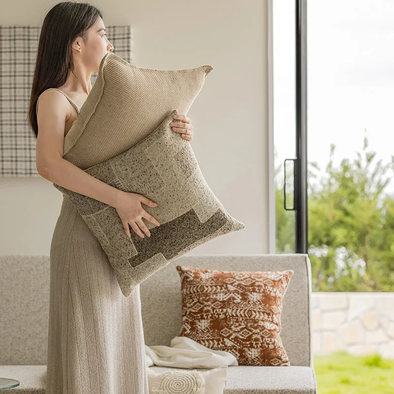 PP cotton decorative pillow cushion on a sofa, shown in a red brown colour, 45x45cm size.