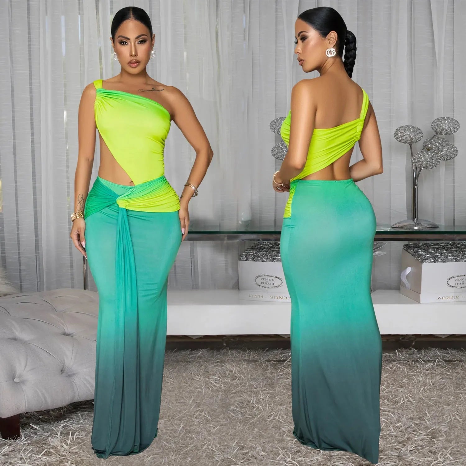 Long gradient-colour summer dress with oblique shoulder neckline and sleeveless design on a mannequin.