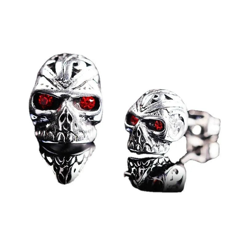 Retro skull stud earrings with red eye detailing and electroplated alloy construction