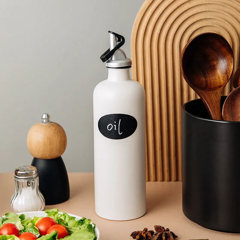 Ceramic oil pot with funnel for kitchen use in black, coffee, or white colour