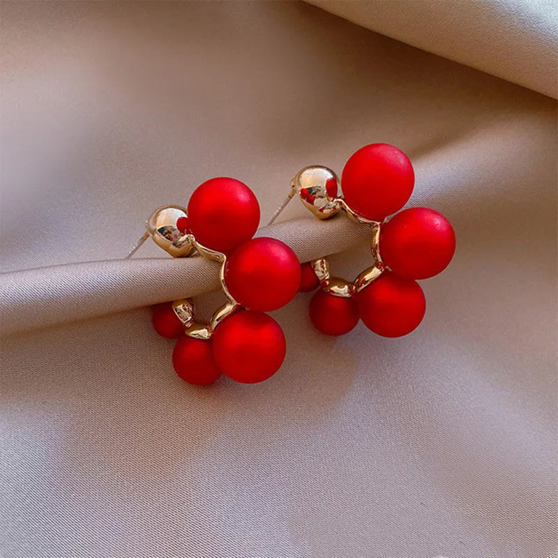 Red bell earrings for women with alloy construction and distinctive bell shape design