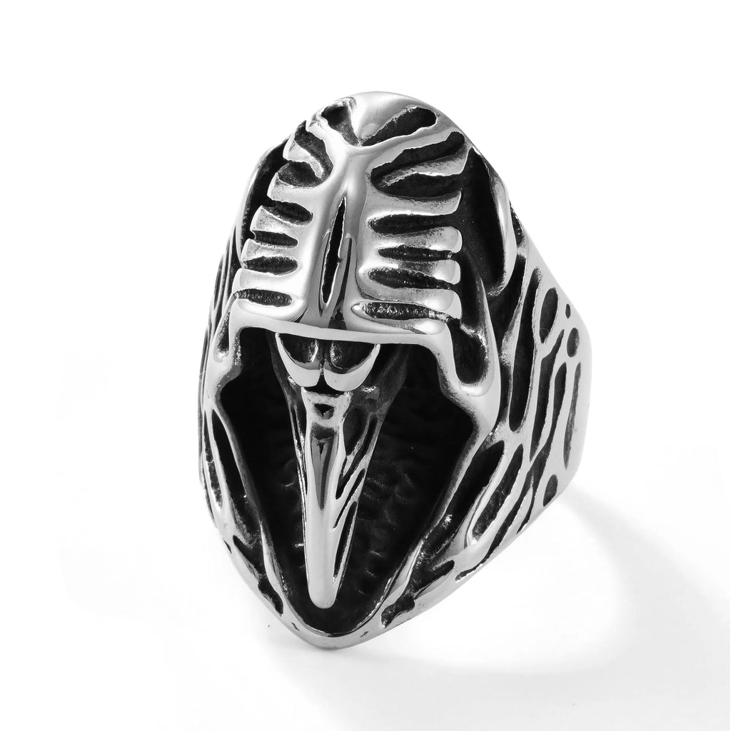 Geometric crow stainless steel ring in MR166 colour on a grey background