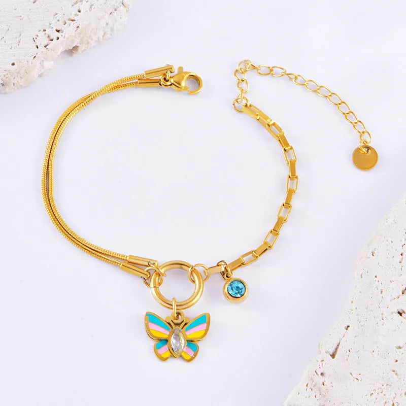 Epoxy butterfly jewellery set with gold colour titanium steel necklace and bracelet