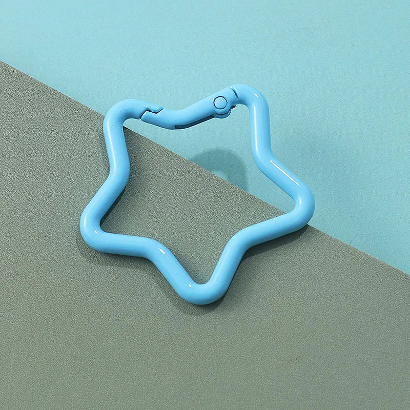 Zinc alloy five-pointed star keychain in a choice of macaron colours for bag decoration.