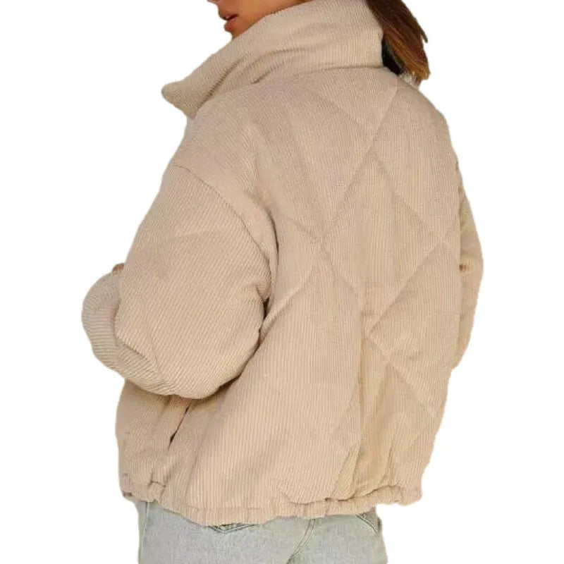Apricot coloured women's corduroy jacket with stand collar and front zip, showing textured fabric detail