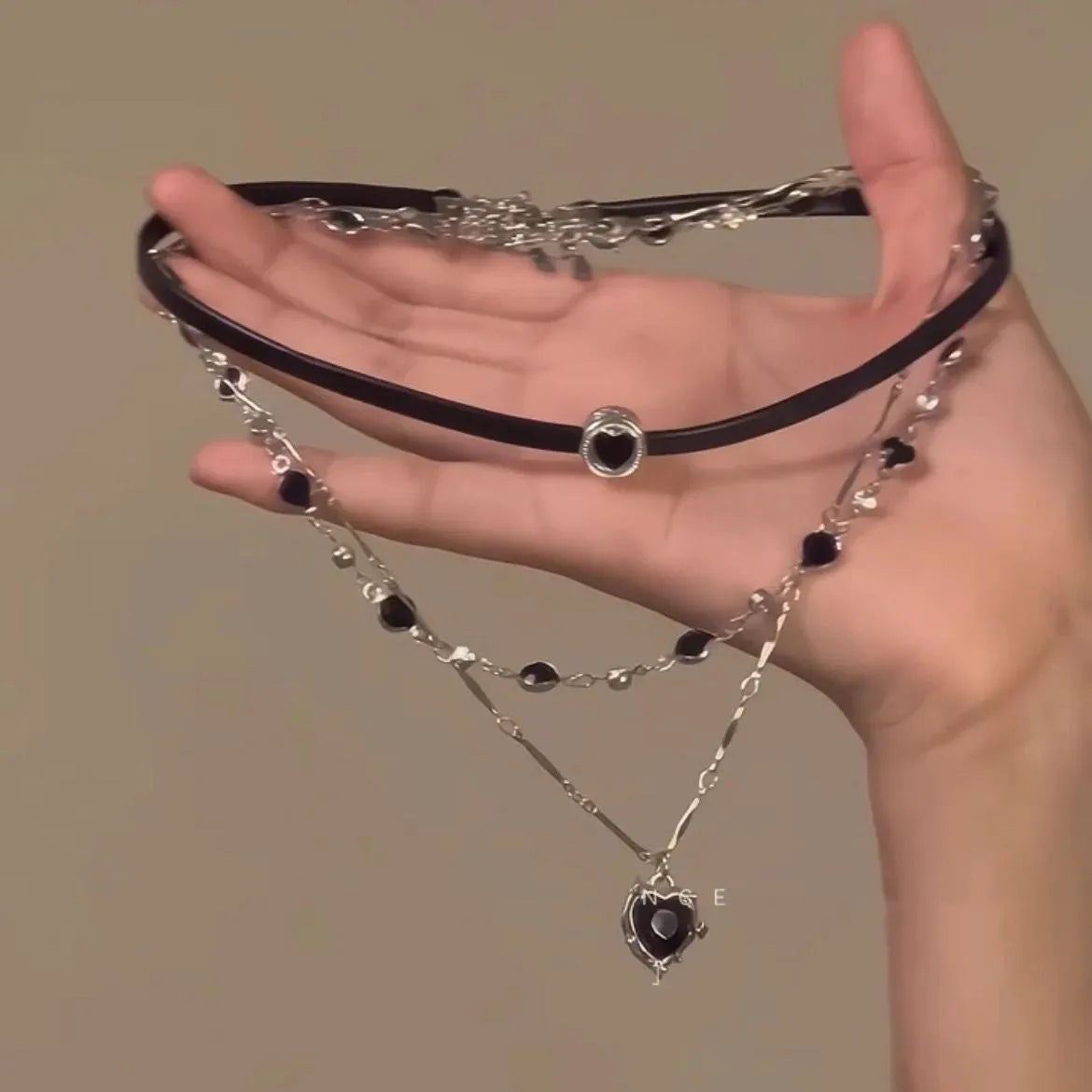 Women's adjustable leather chain necklace set with artificial crystal heart pendants in multi-layer design