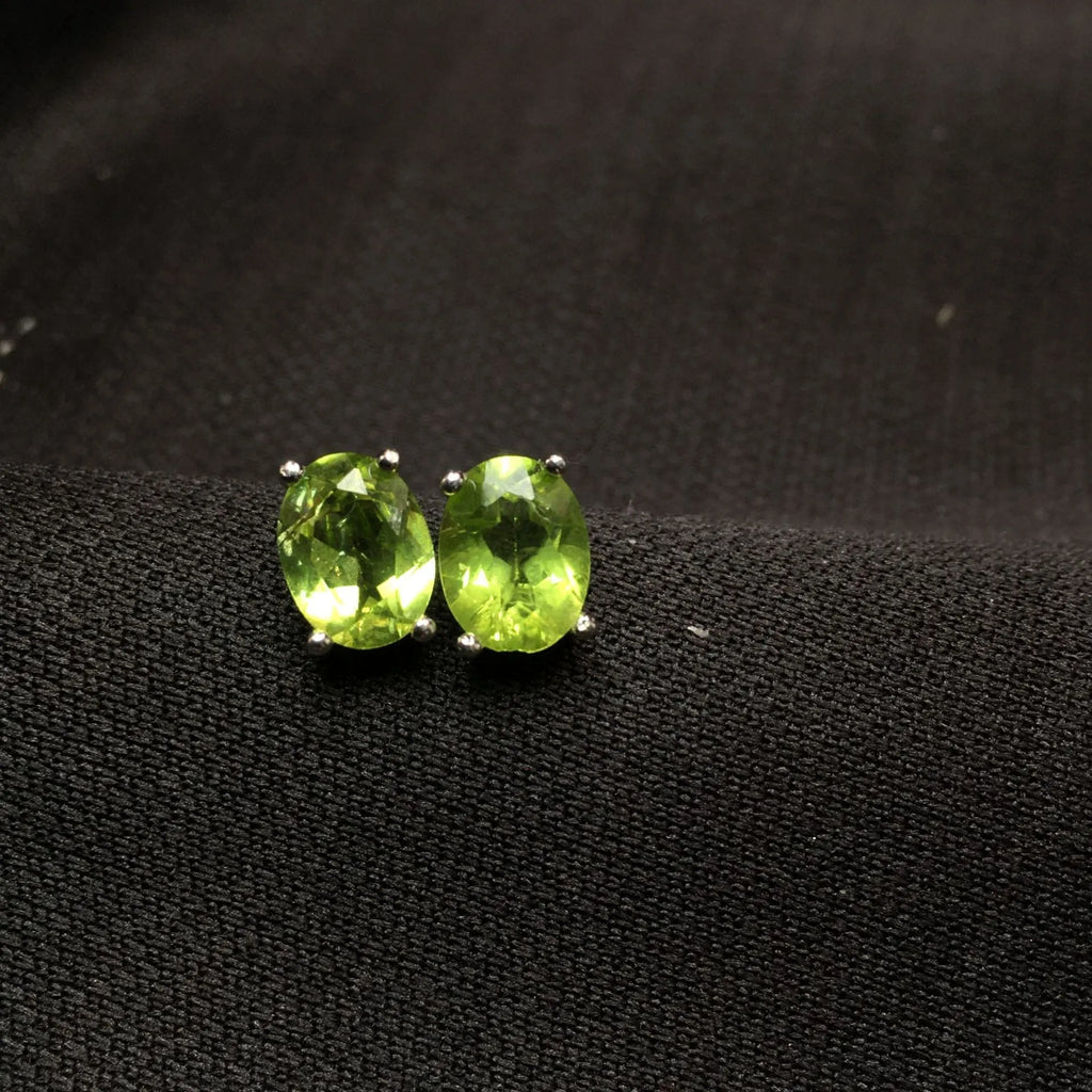 Grass green natural olivine faceted stud earrings in S925 sterling silver with 6×8mm oval stones