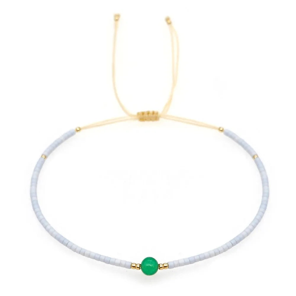 Handmade bohemian-style bracelet with colourful geometric glass beads for women.